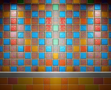 Petits carreaux colorés sur un mur