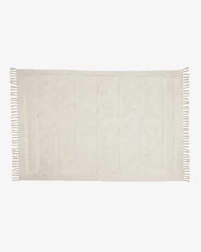 Un tapis en coton beige 140x200 cm 