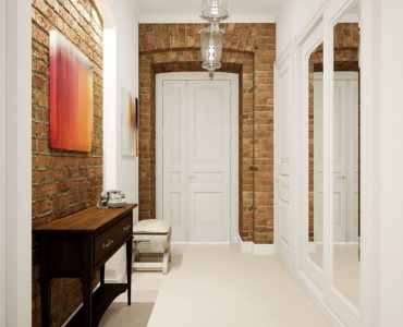 Couloir blanc avec une partie de murs en briques