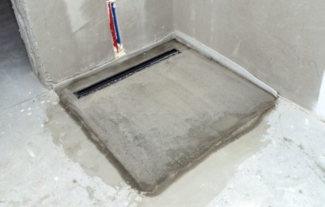 Préparation et cimentage de l'emplacement d'une douche