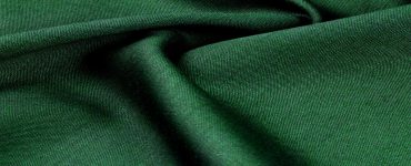 Zoom sur la texture d'un tissu vert