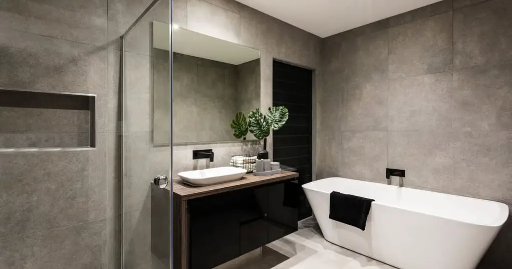 Salle de bain de couleur gris sans fenêtre