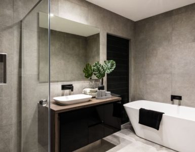 Salle de bain de couleur gris sans fenêtre