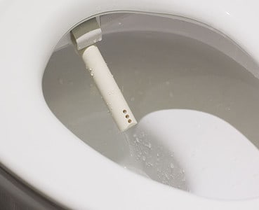 Cuvette de toilette de style japonais avec système de jet d’eau