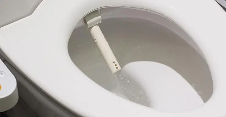 Cuvette de toilette de style japonais avec système de jet d’eau