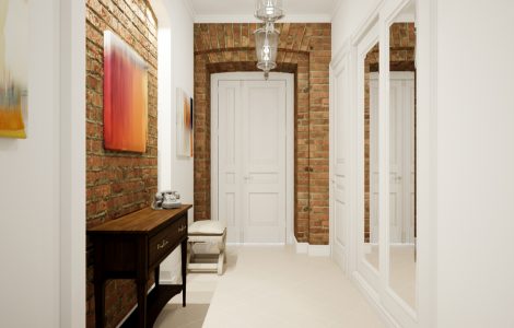 Vue sur un couloir blanc avec des murs en briques et une porte blanche