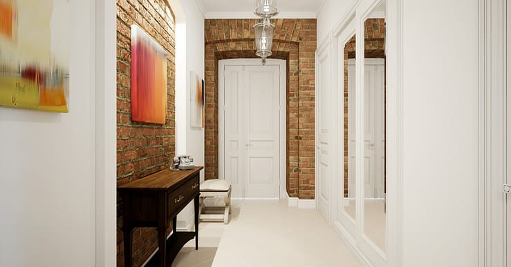 Vue sur un couloir blanc avec des murs en briques et une porte blanche