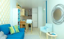 un petit salon aux tons bleus dans un studio