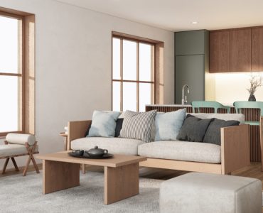 Un salon style japonais avec canapé en bois et table basse en bois