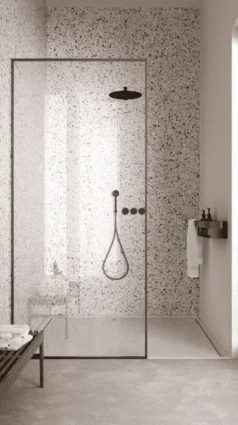 Un mur en terrazzo pour cette douche à l'italienne