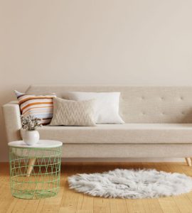 Un canapé gris style scandinave dans le salon