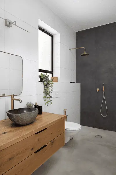 Pour agrandir visuellement votre salle de bain et gagner de la place, rien ne vaut les meubles suspendus !